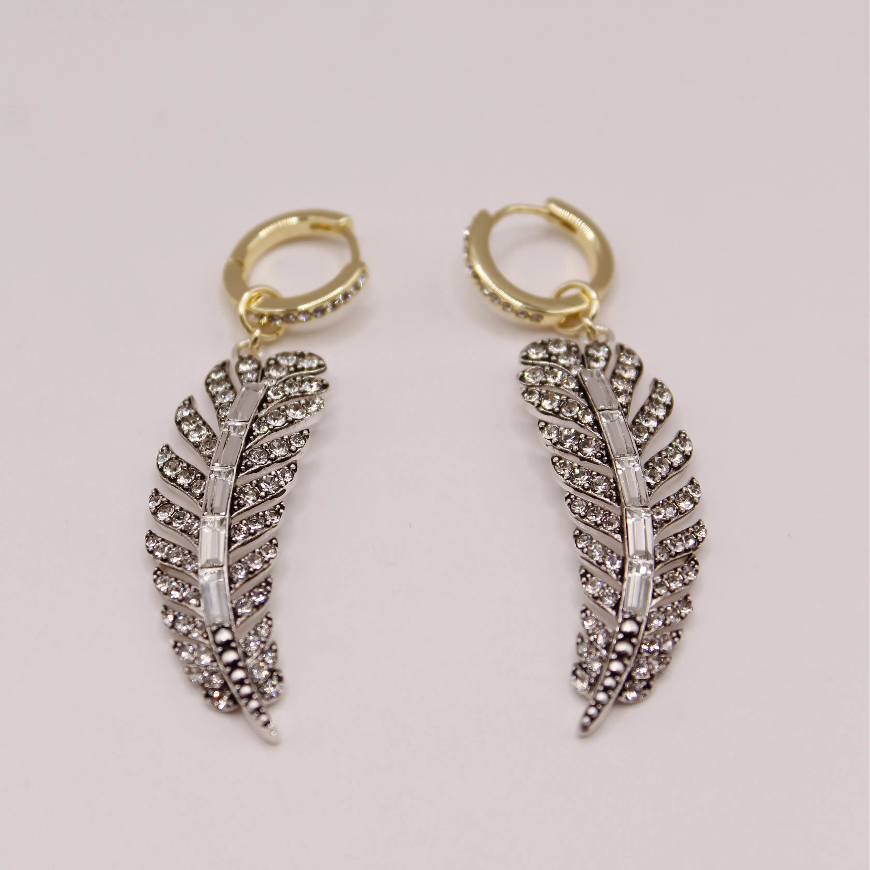 The Angel Feather Convertible Huggie Hoop sold by Lulu Frost product image thumbnail 3
