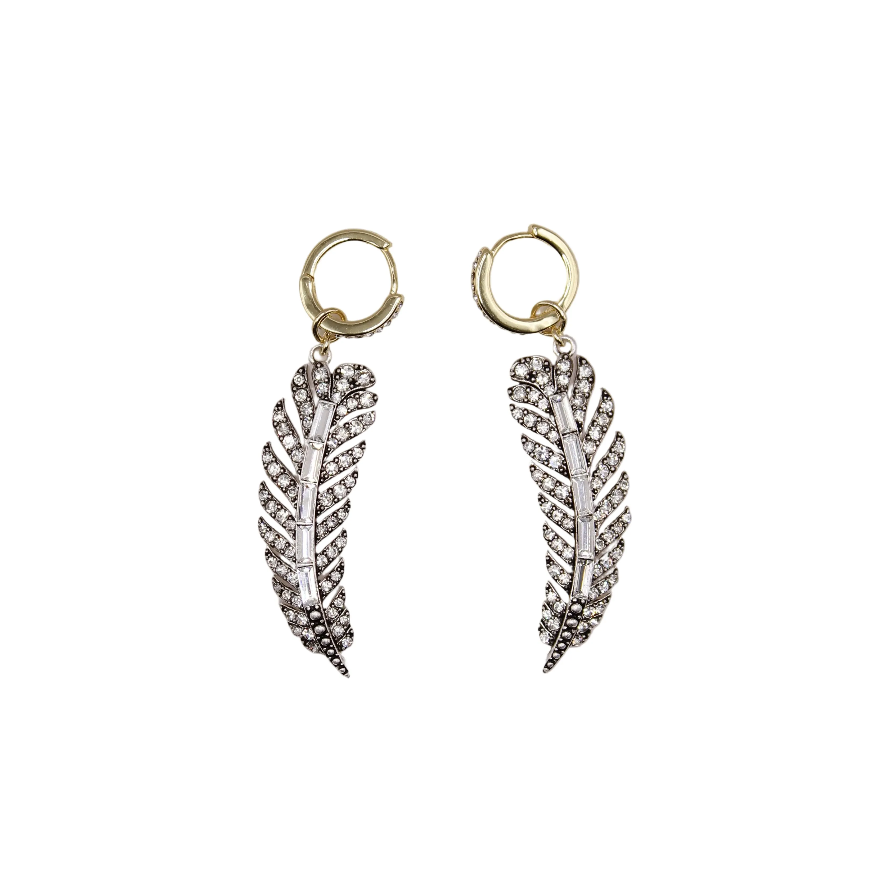 The Angel Feather Convertible Huggie Hoop sold by Lulu Frost