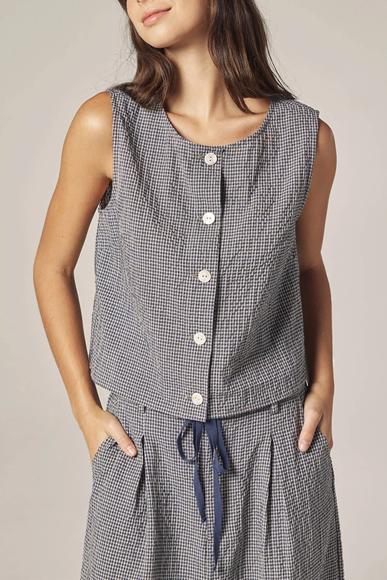 Plaid button down top sold by Lulu Frost