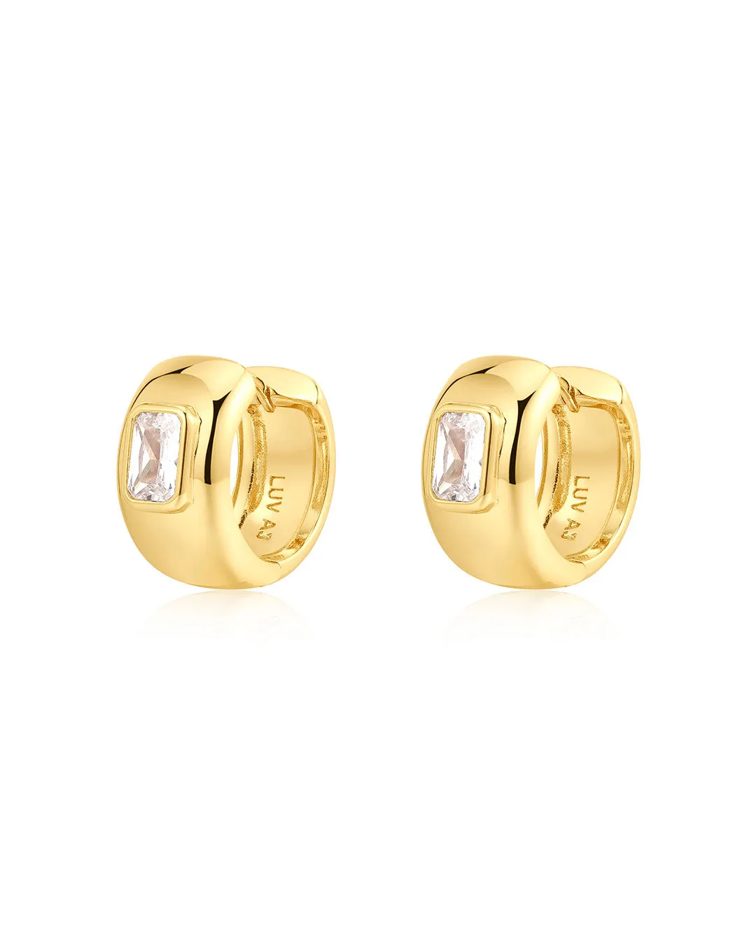 The Emerald Bezel Stone Huggies sold by Luv Aj