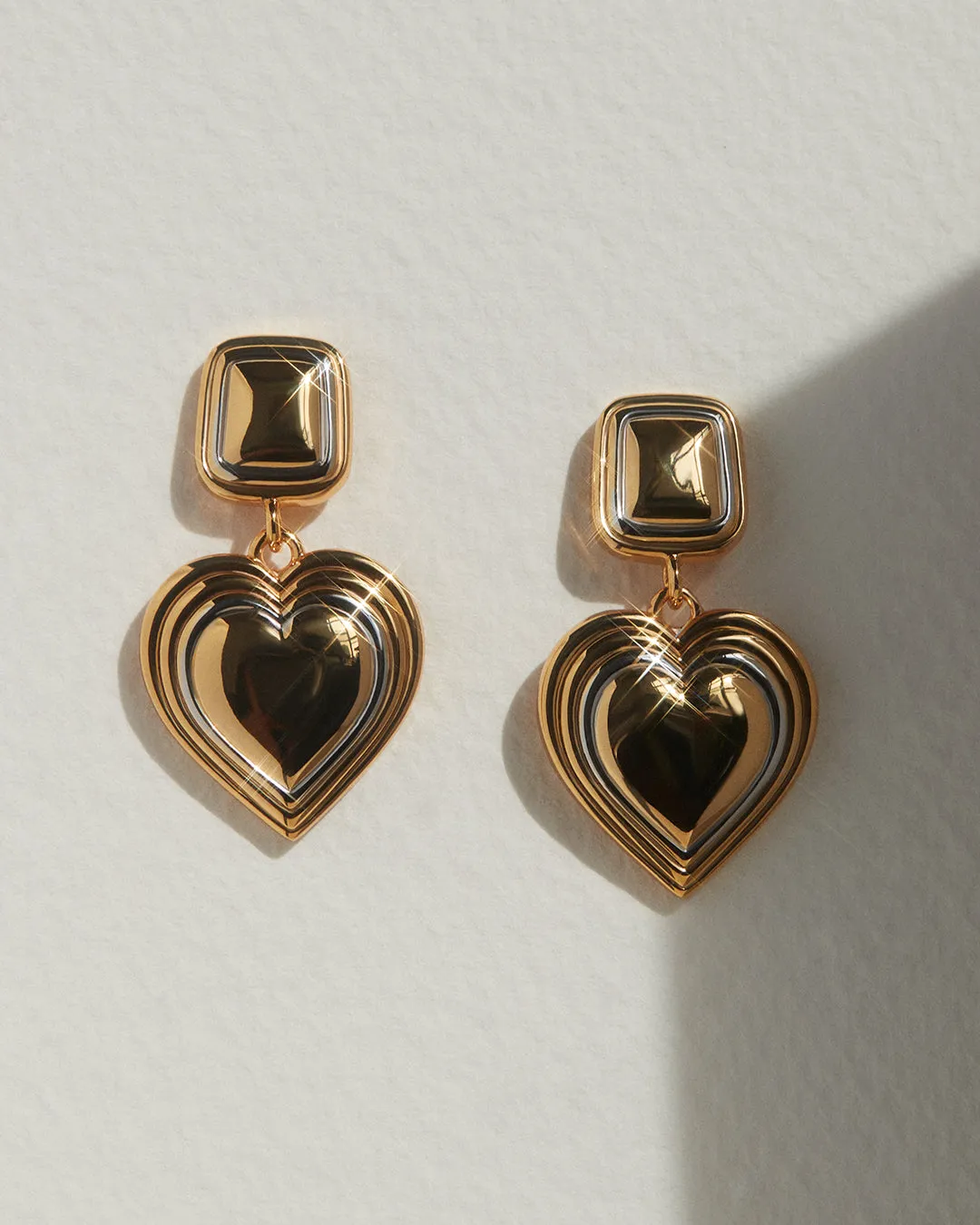 Two-Tone Heart Earrings sold by Luv Aj product image thumbnail 4