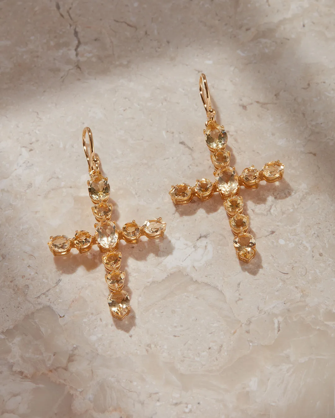 The Isabella Cross Earrings sold by Luv Aj