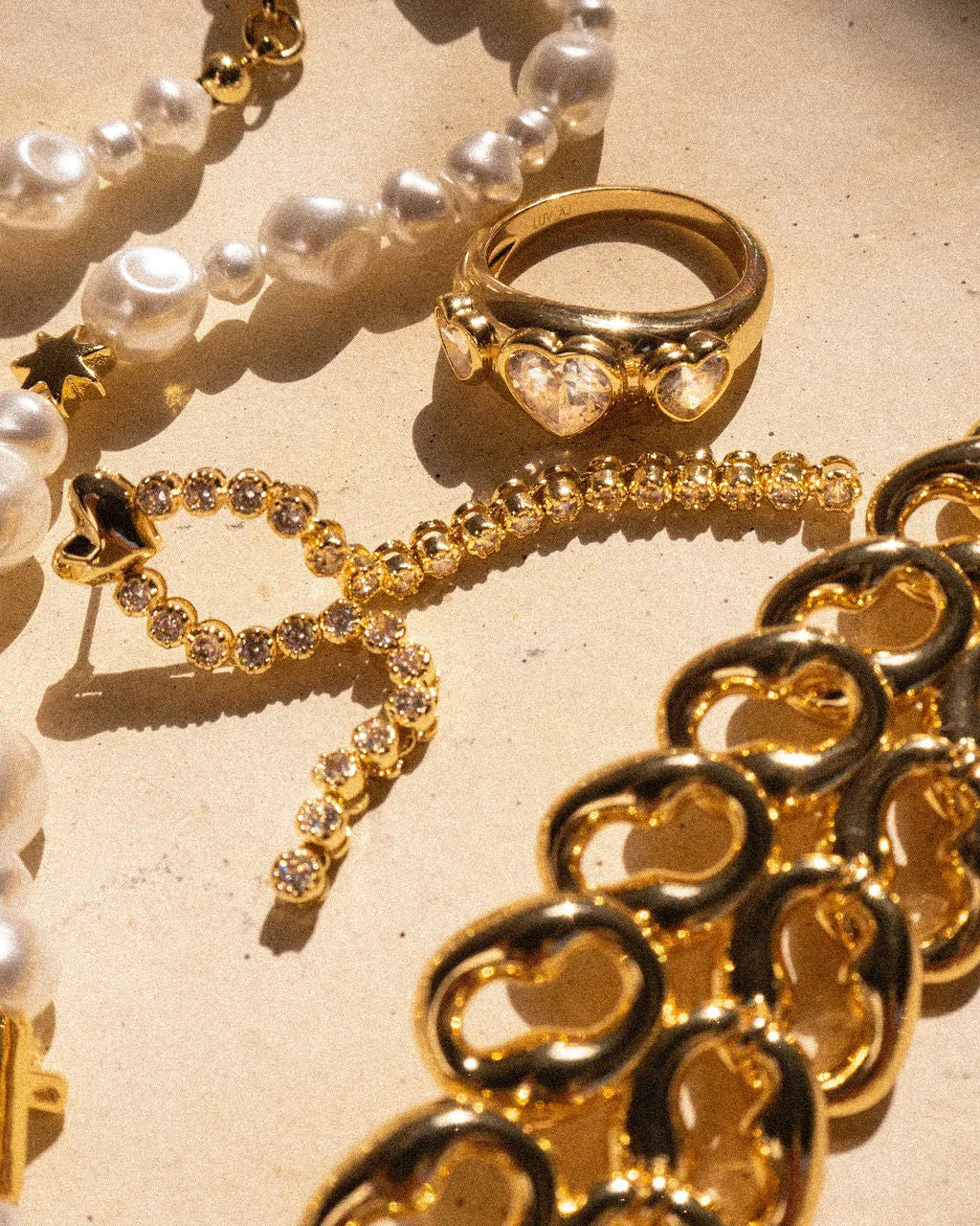 The Molten Heart Cascading Studs sold by Luv Aj product image thumbnail 5