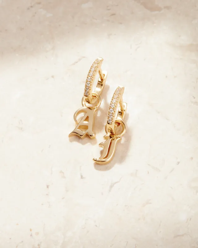 The Pave Metal Hoops with Initial Charms [Old English] sold by Luv Aj