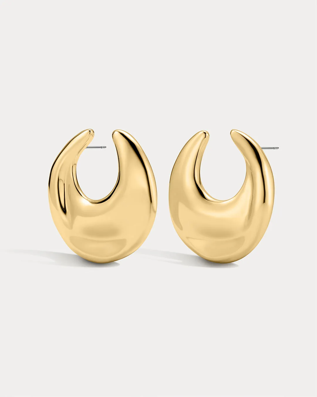 The Mercury Disc Statement Studs sold by Luv Aj