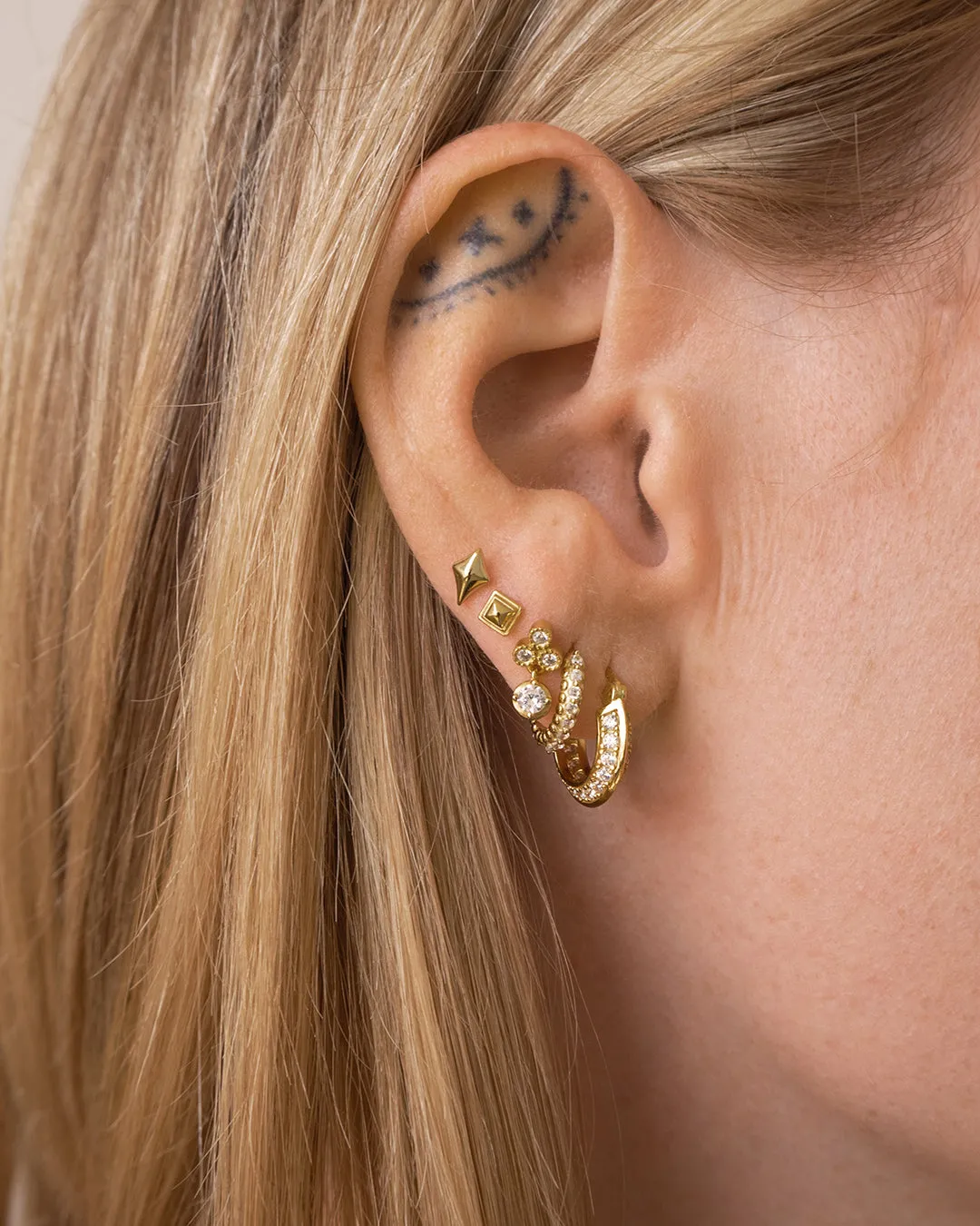 The Metal Step Cut Pyramid Studs sold by Luv Aj product image thumbnail 3