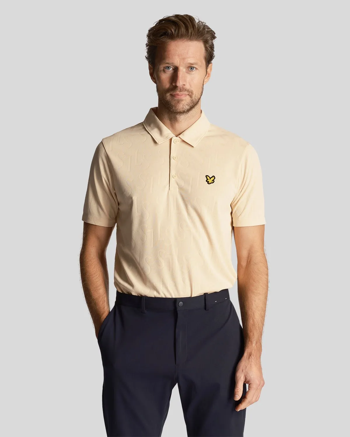 Golf Monogram Jacquard Polo Shirt sold by Lyle & Scott