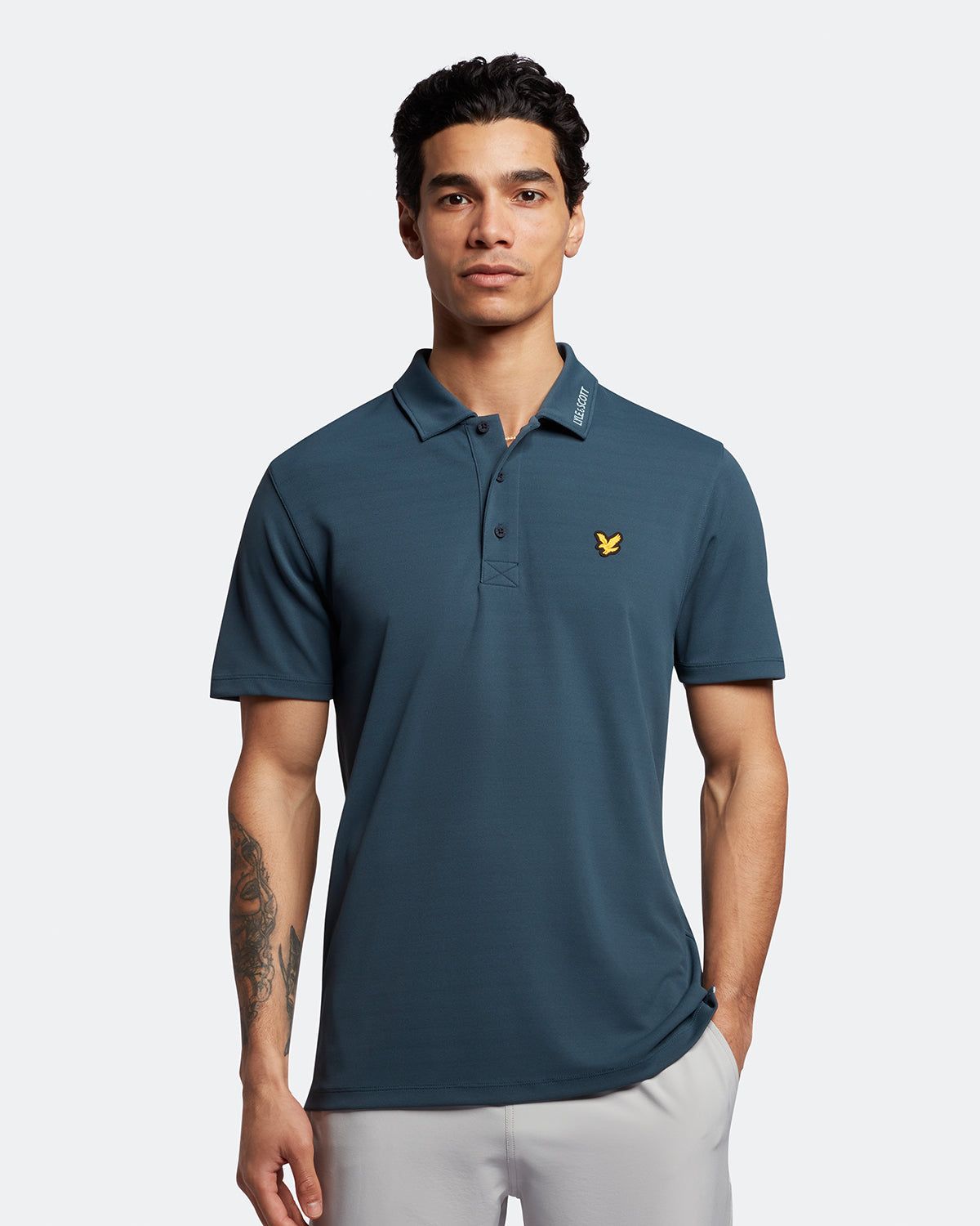 Golf Collar Logo Technical Polo Shirt sold by Lyle & Scott