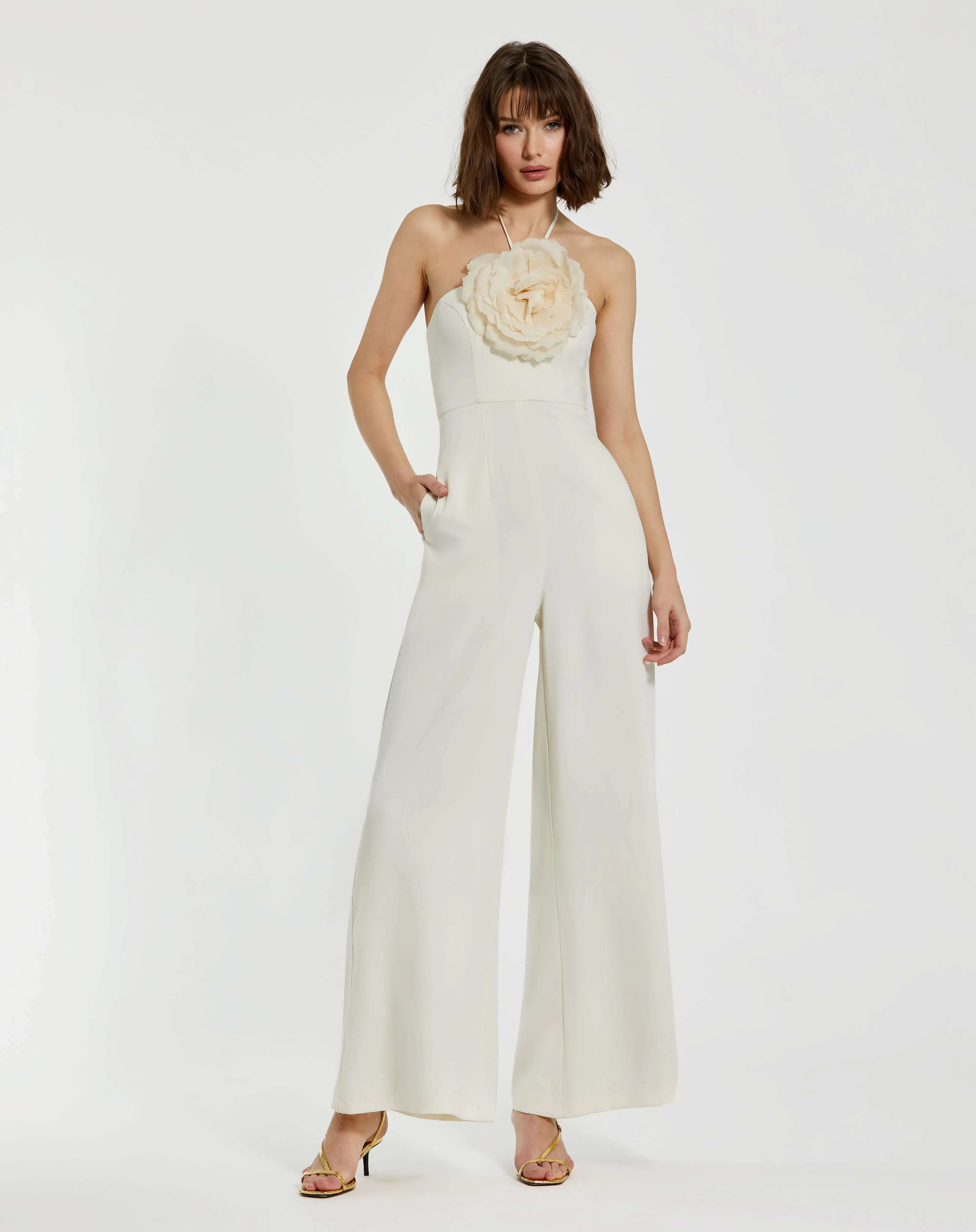 Ivory Halter Neck Crepe Jumpsuit With 3D Flower sold by Mac Duggal