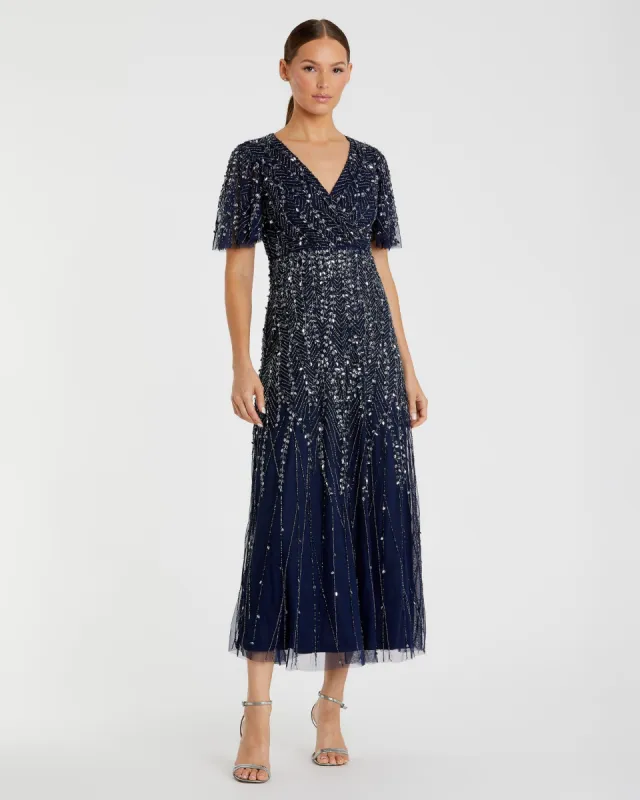 Navy Beaded Wrap Over Butterfly Sleeve Dress sold by Mac Duggal