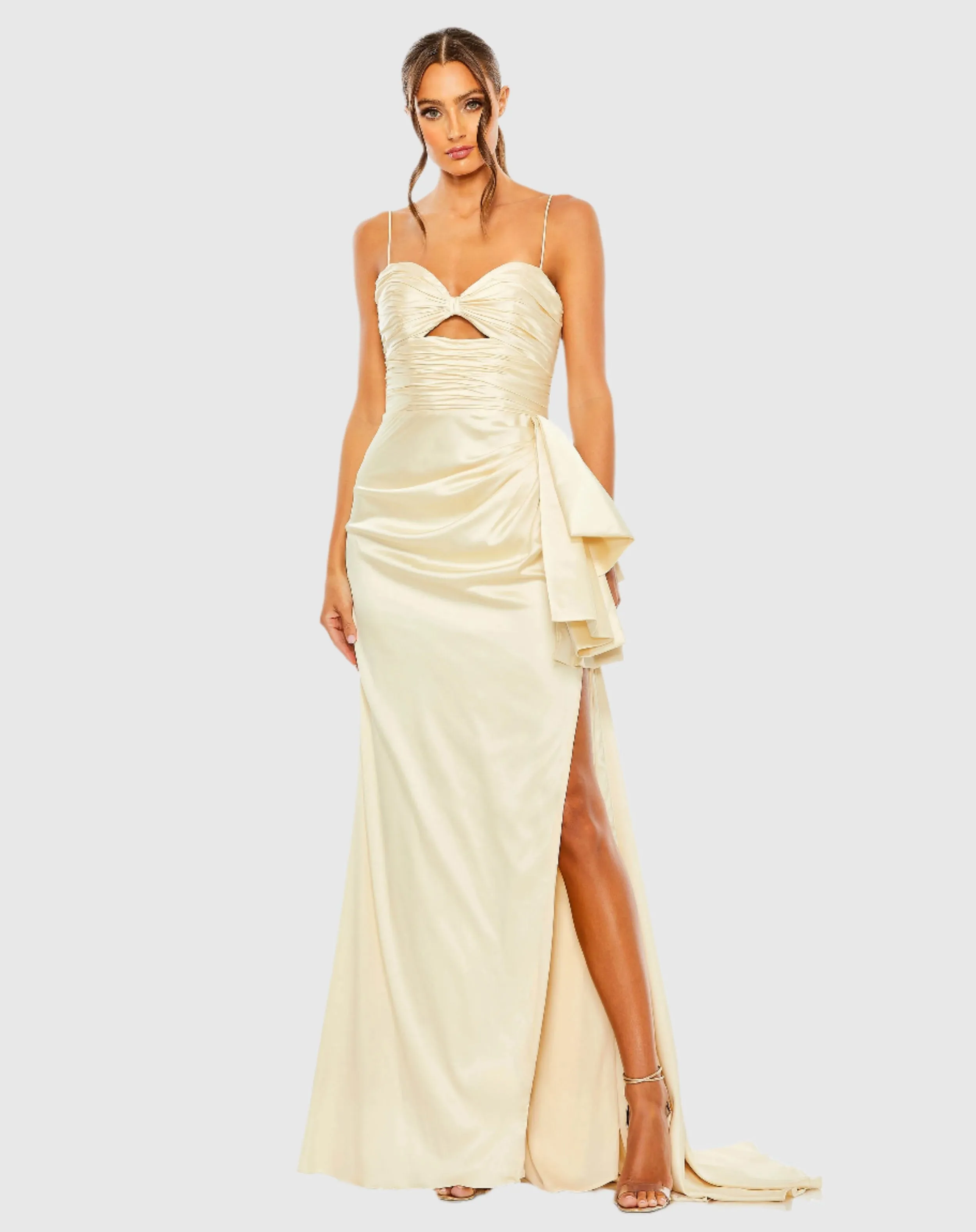 Beige Spaghetti Strap Cut Out Side Bow Gown sold by Mac Duggal