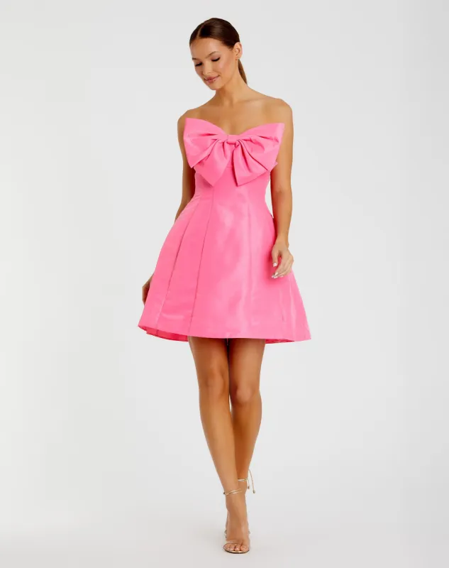 Pink Strapless Oversized Bow Fit & Flare Mini Dress sold by Mac Duggal