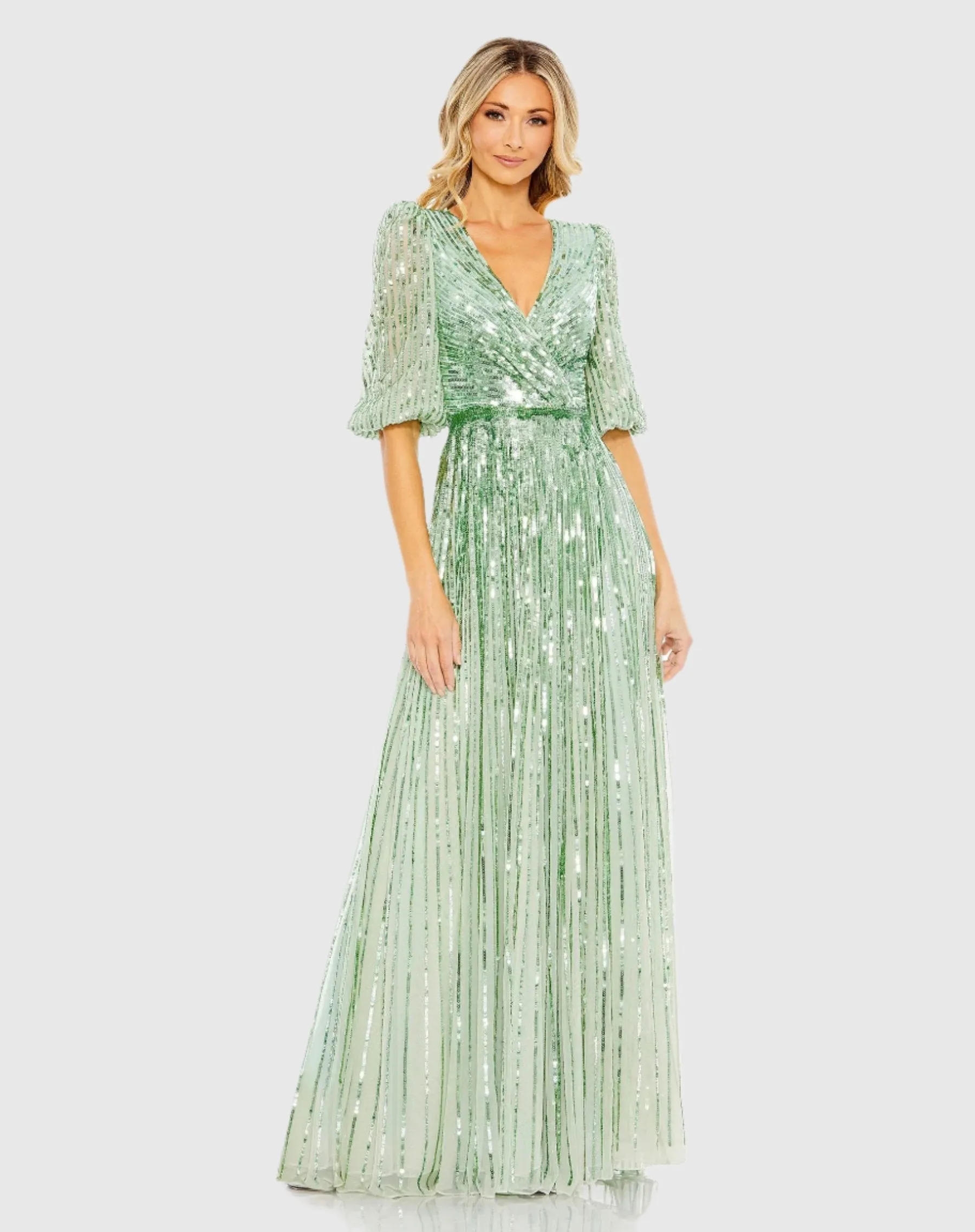 Green Sequined Wrap Over 3/4 Sleeve Gown sold by Mac Duggal
