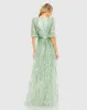 Green Sequined Wrap Over 3/4 Sleeve Gown sold by Mac Duggal