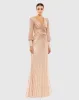 Sequined Wrap Over Bishop Sleeve Gown sold by Mac Duggal