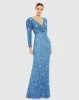 Puff Shoulder Sequined Surplice Gown sold by Mac Duggal