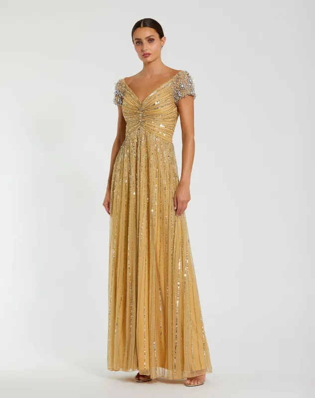 Gold Sequined Evening Gown With Embellished Shoulders sold by Mac Duggal