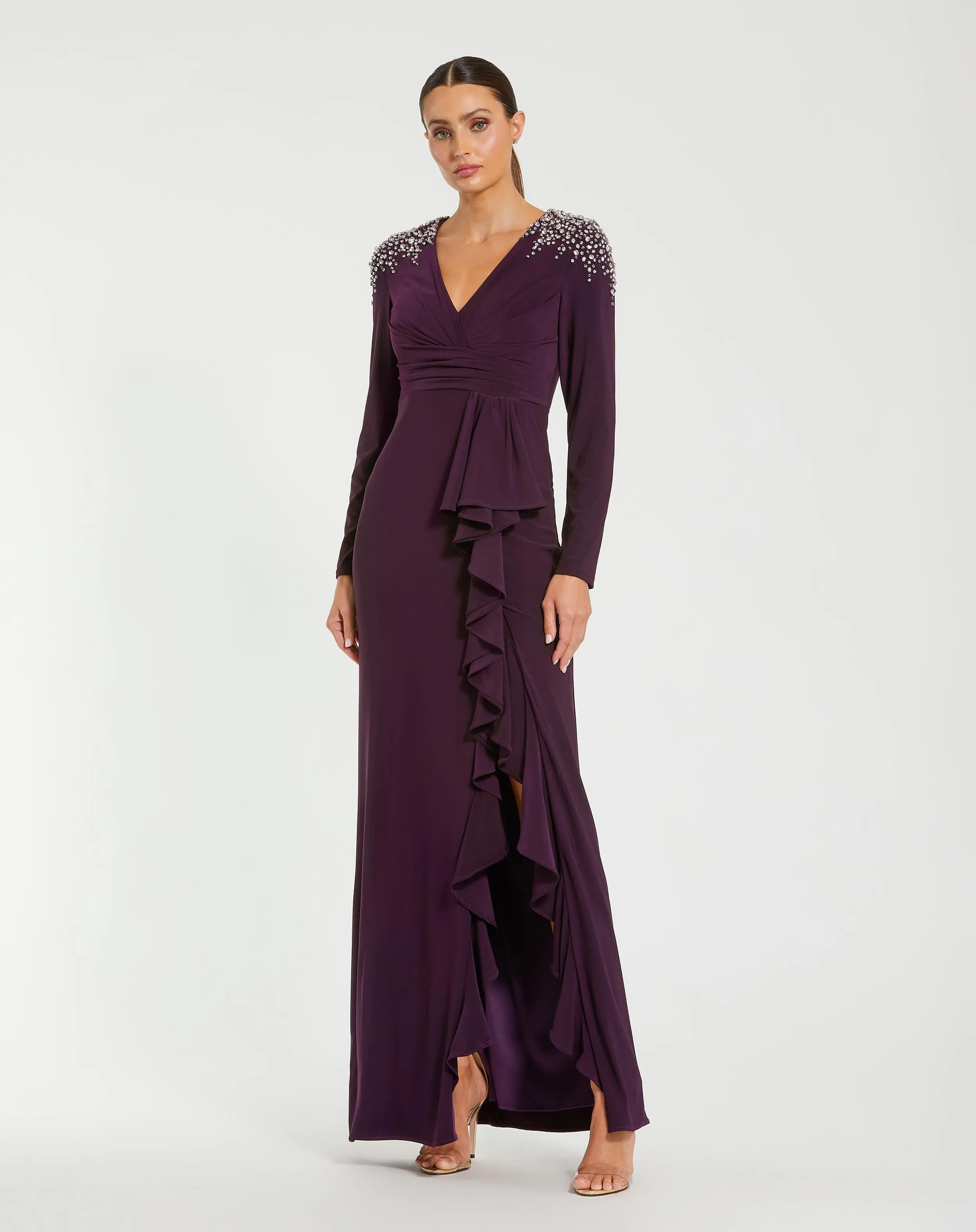 Purple Long Sleeve Gown with Cascading Ruffle & Rhinestone Shoulders sold by Mac Duggal