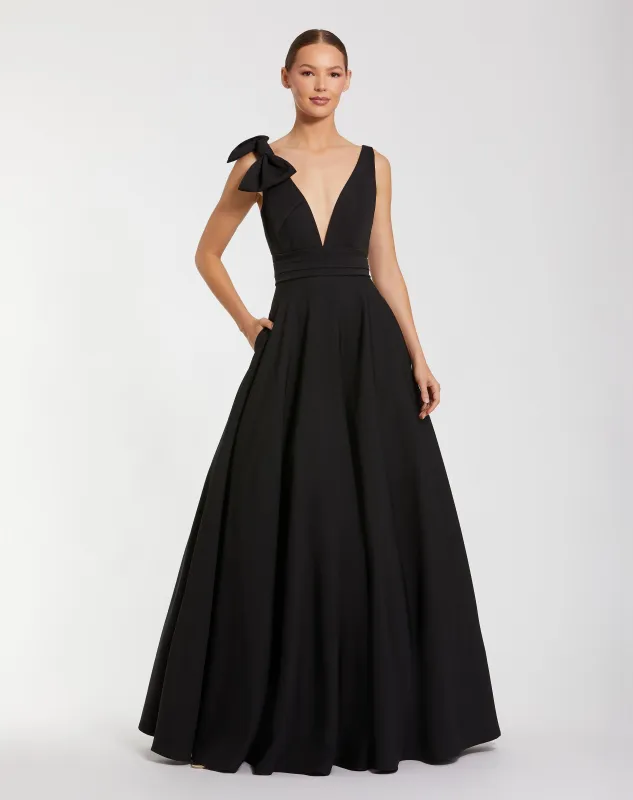 Black Sleeveless Plunge Neck Crepe Ballgown With Bow Detail sold by Mac Duggal