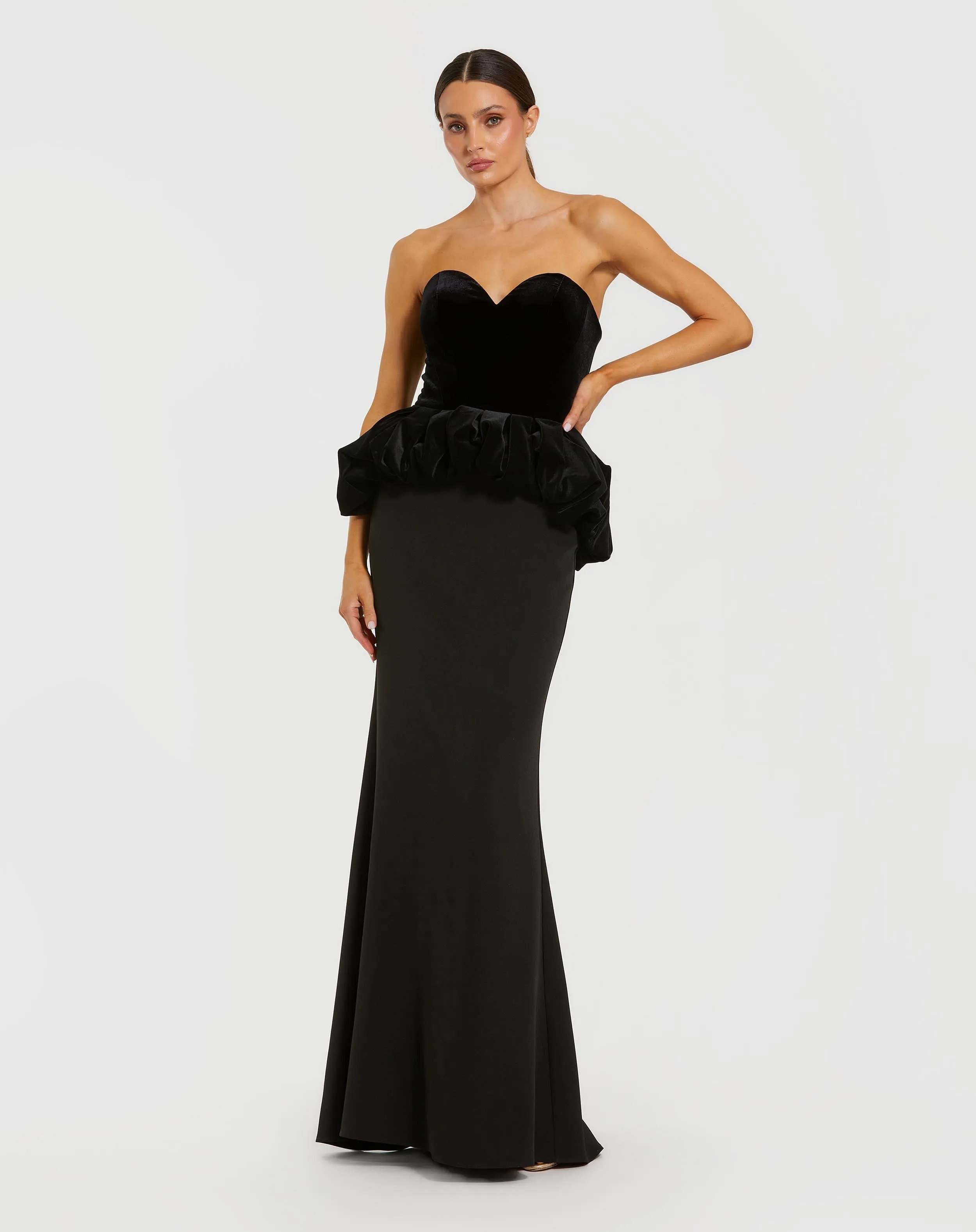 Black Strapless Velvet Peplum Gown sold by Mac Duggal