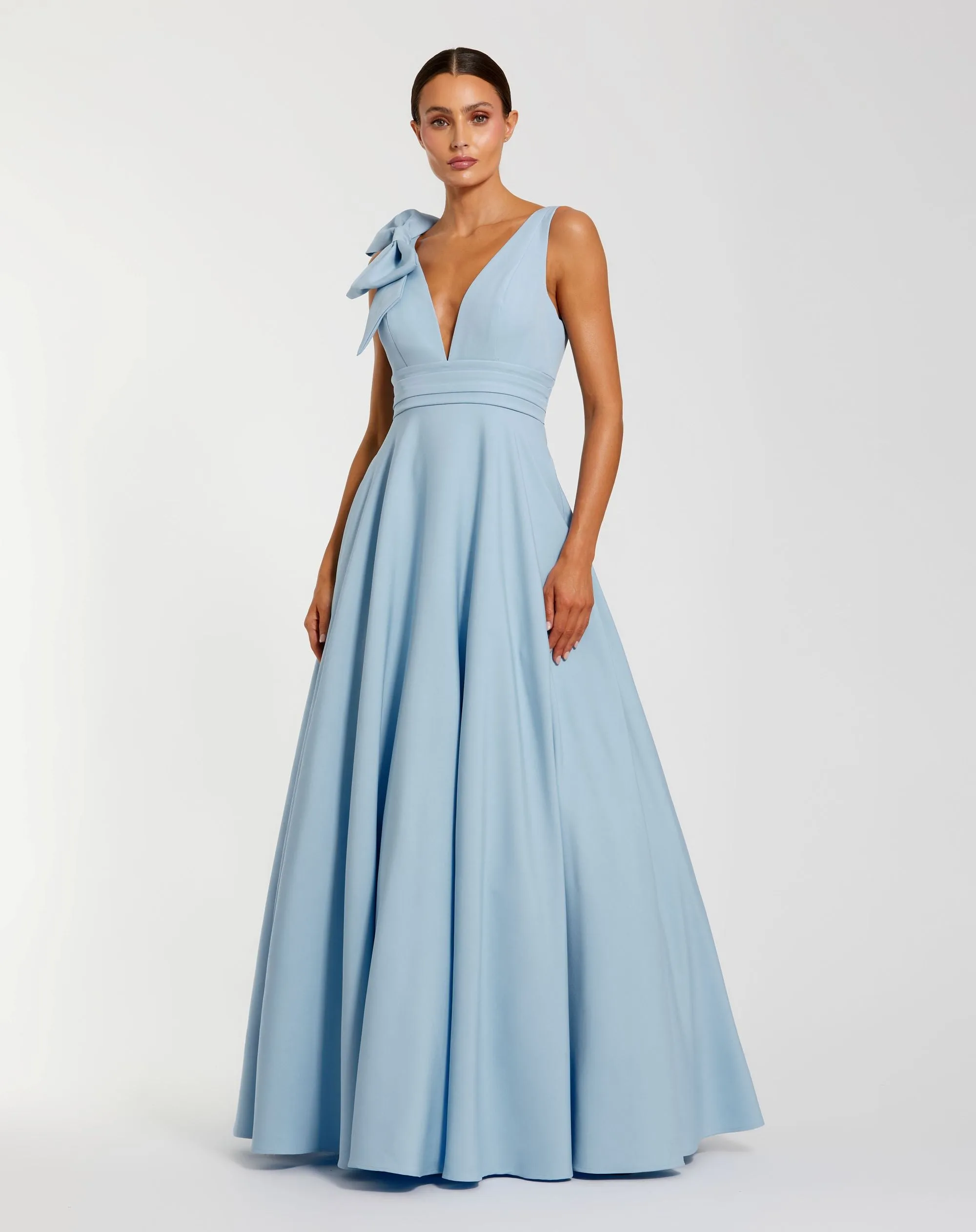 Petite Light Blue Sleeveless Plunge Neck Ball Gown With Bow Detail sold by Mac Duggal