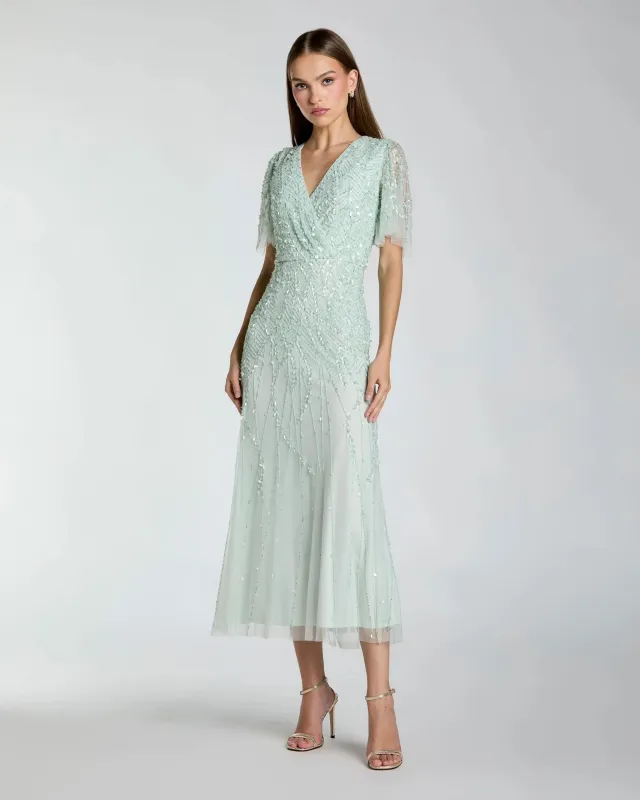 Blue Beaded Wrap Over Butterfly Sleeve Dress made by Mac Duggal