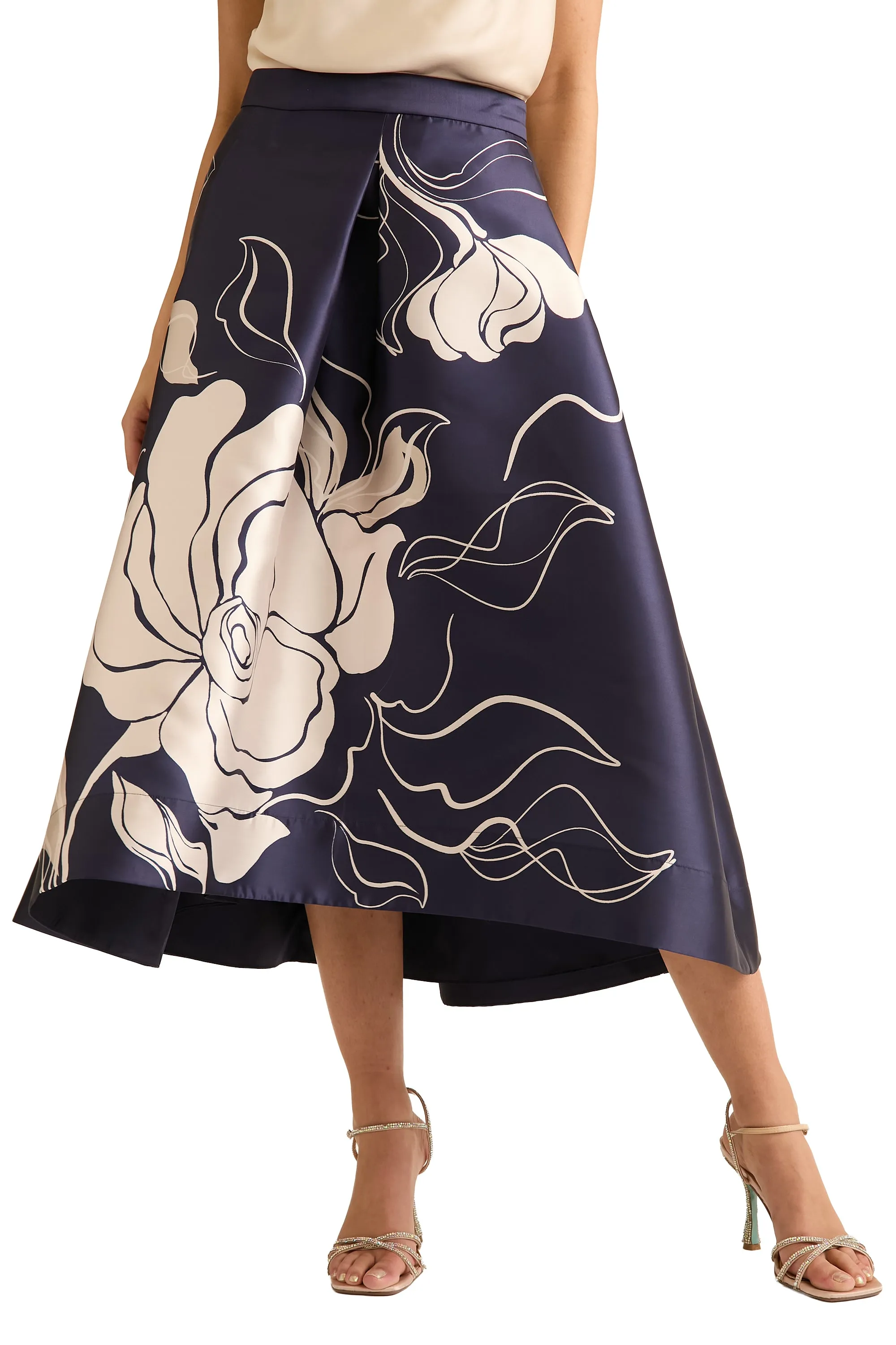 Gramercy Pleated High Low Skirt in Floral Eclipse sold by Maggy London