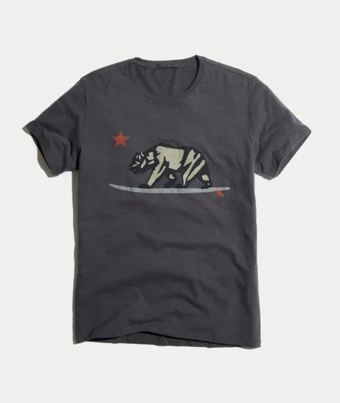Surfing Bear Graphic in Midnight Navy sold by Marine Layer