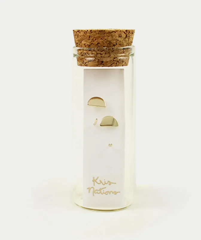 Kris Nations Tiny Half Moon Stud Earrings sold by Marine Layer