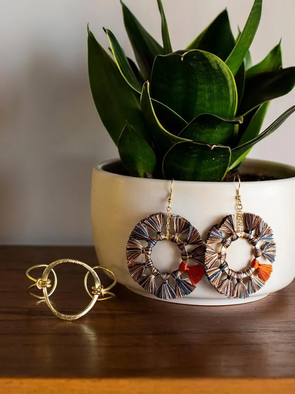 Turning Tassel Earrings - Multi sold by Mata Traders