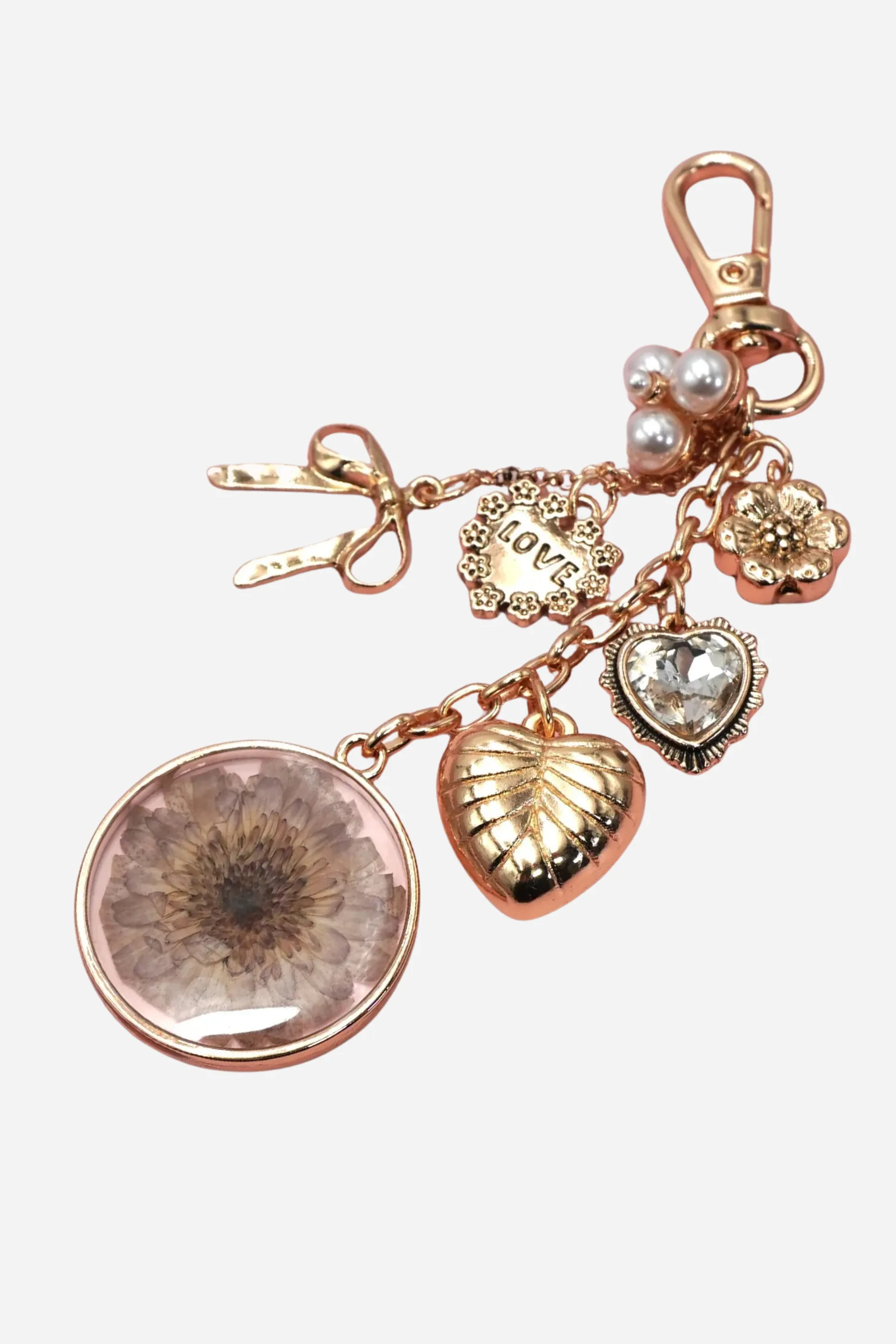 Pressed Flower Bag Charm sold by Maude