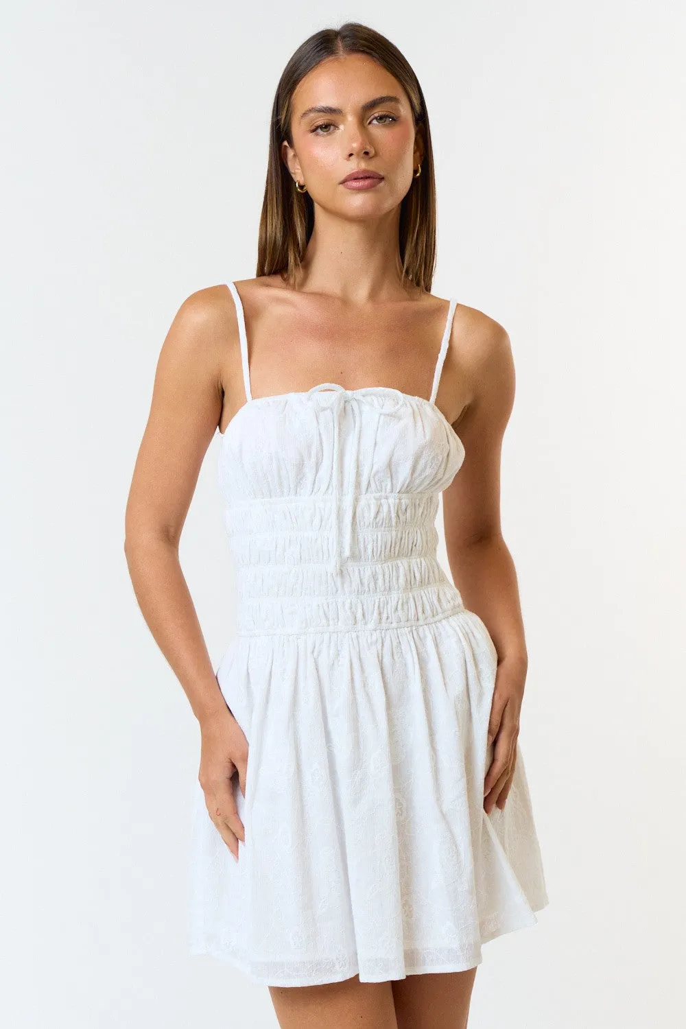 Floral Smocked Tube Mini Dress sold by Maude