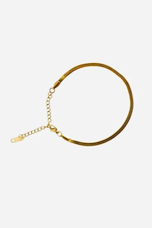 18K Alice Thin Herringbone Bracelet sold by Maude