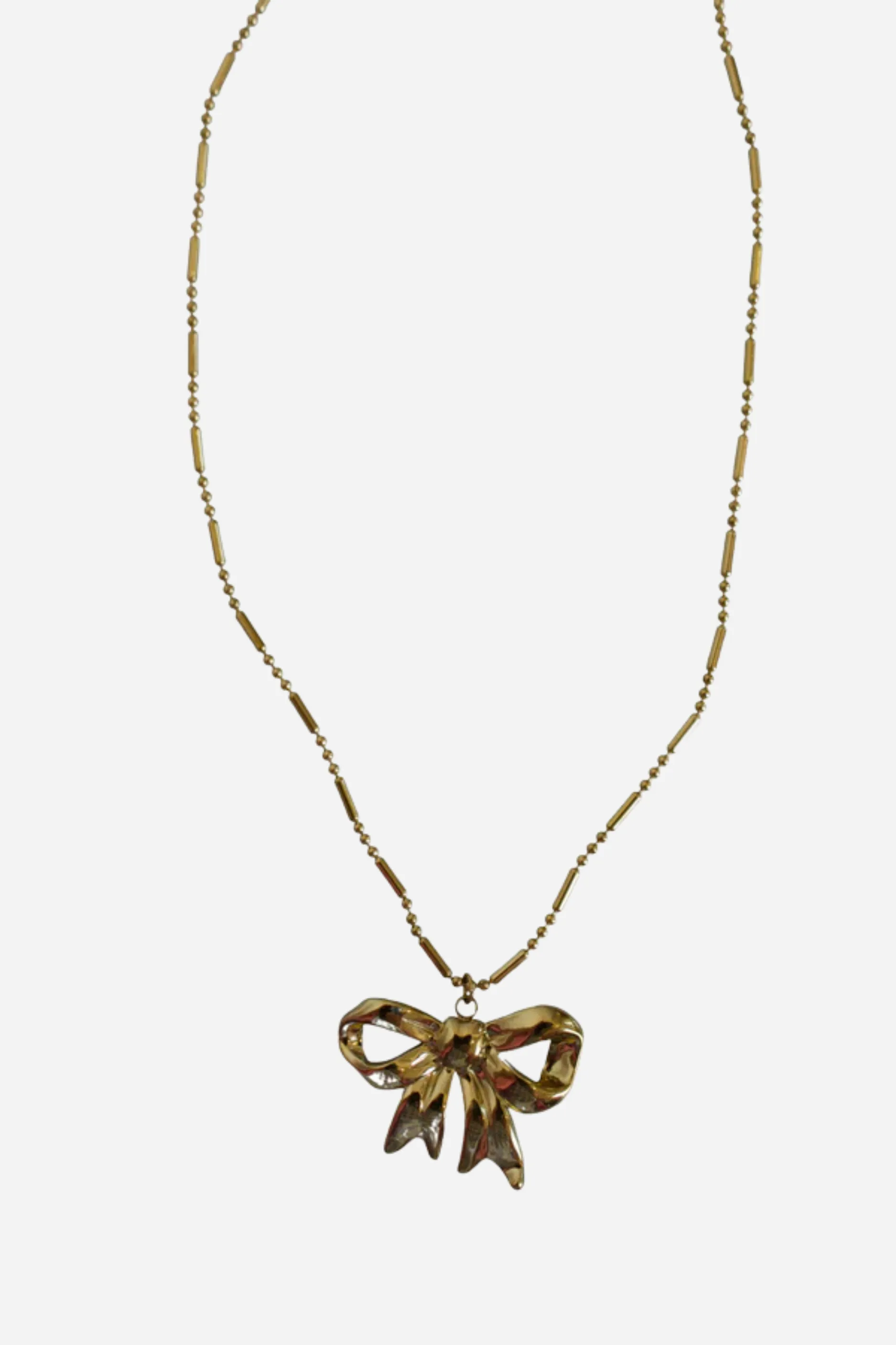 18K Rose Bow Necklace sold by Maude