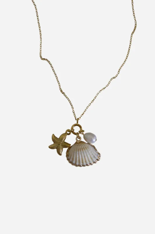 18K Daphne Seashell Charm Necklace sold by Maude
