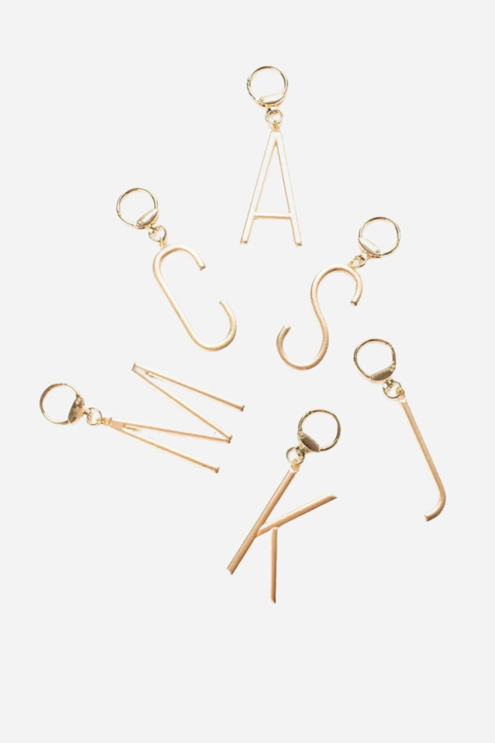 Gold Initial Bag Charm sold by Maude