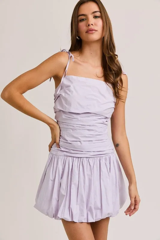 Tie Shoulder Bubble Hem Mini Dress - Lavender sold by Maude