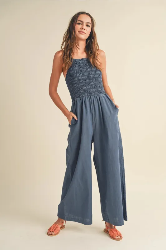 Smocked Denim Jumpsuit - Blue sold by Maude