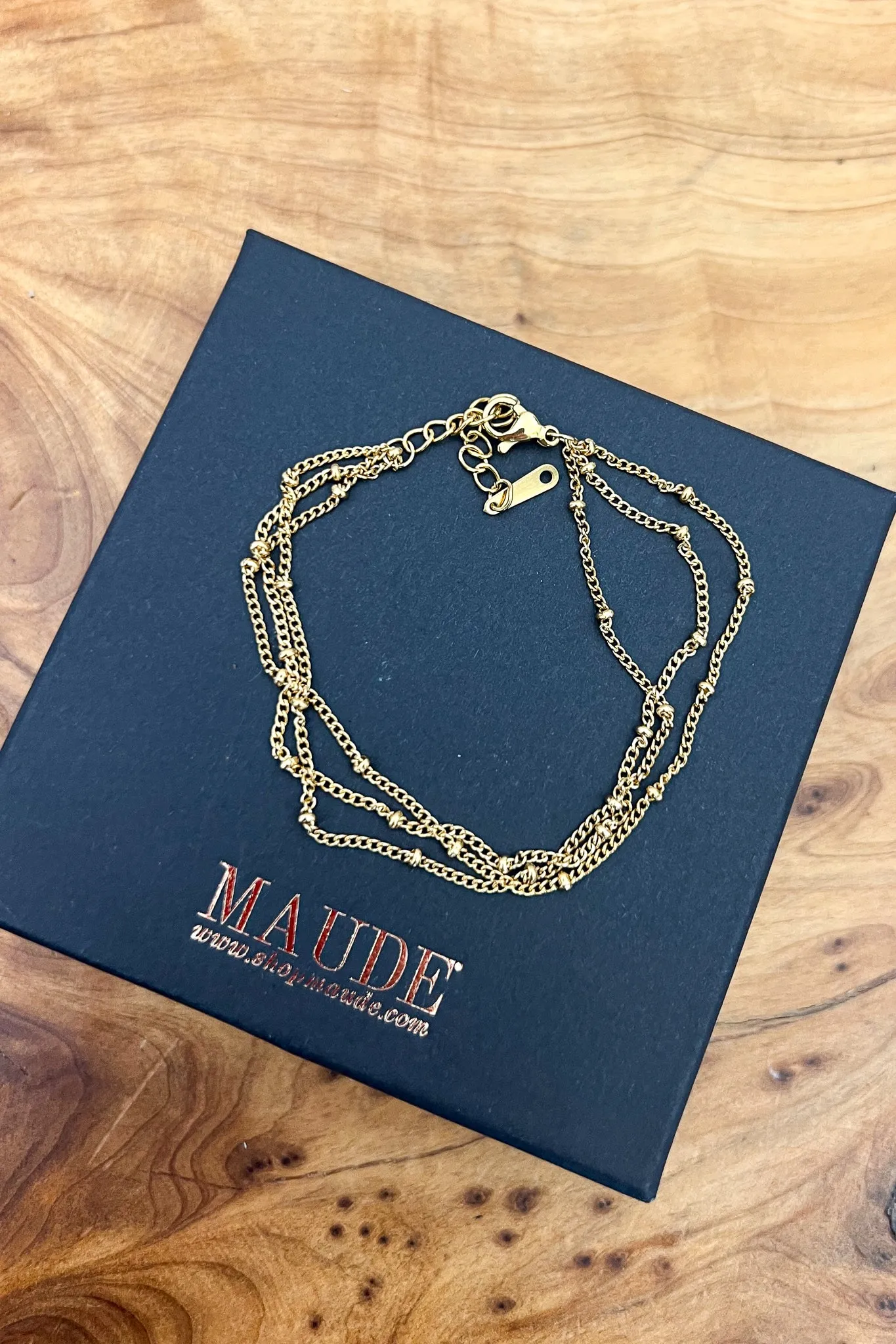 18K Triple Chain Bracelet sold by Maude