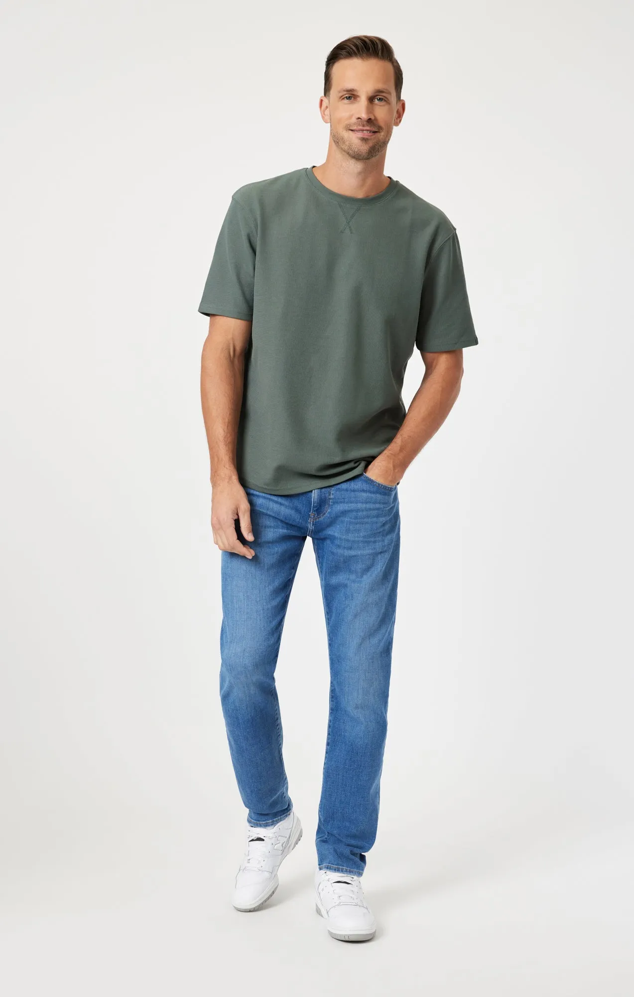 JAKE SLIM LEG IN MID BRUSHED FEATHER BLUE sold by Mavi