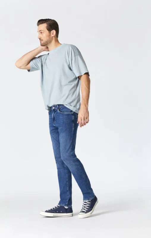 JAKE SLIM LEG JEANS IN MID BRUSHED FEATHER BLUE sold by Mavi