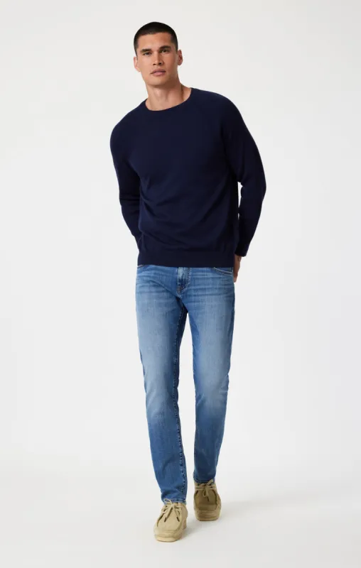 JAKE SLIM LEG IN MID BRUSHED NASHVILLE sold by Mavi