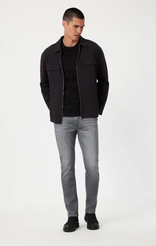 JAKE SLIM LEG IN LIGHT SMOKE FEATHER BLUE sold by Mavi