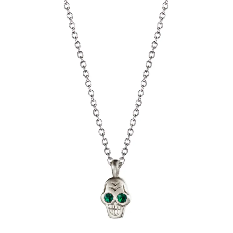 Sterling Silver Tiny Skull Pendant with Emerald Eyes sold by Me & Ro