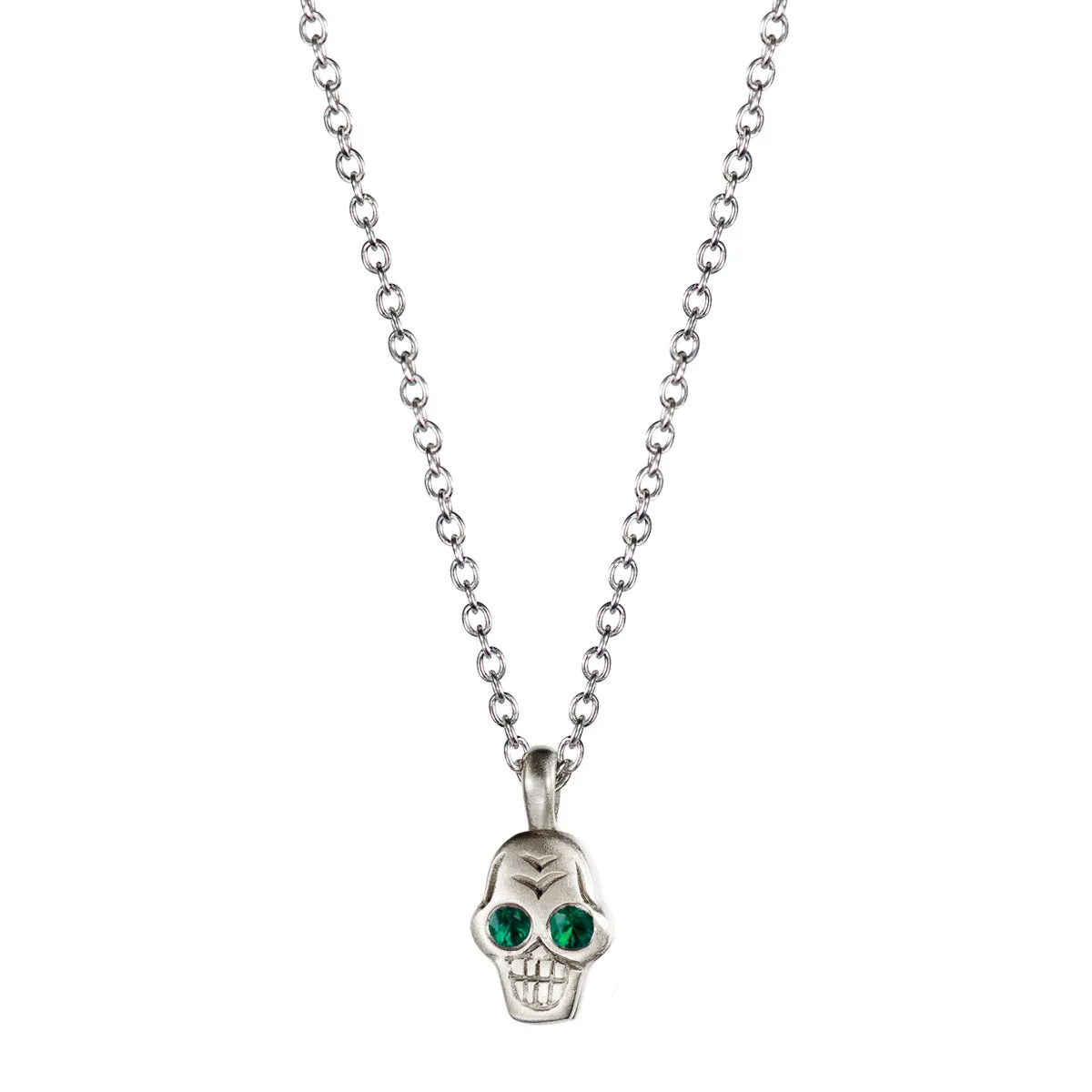 Sterling Silver Tiny Skull Pendant with Emerald Eyes sold by Me & Ro