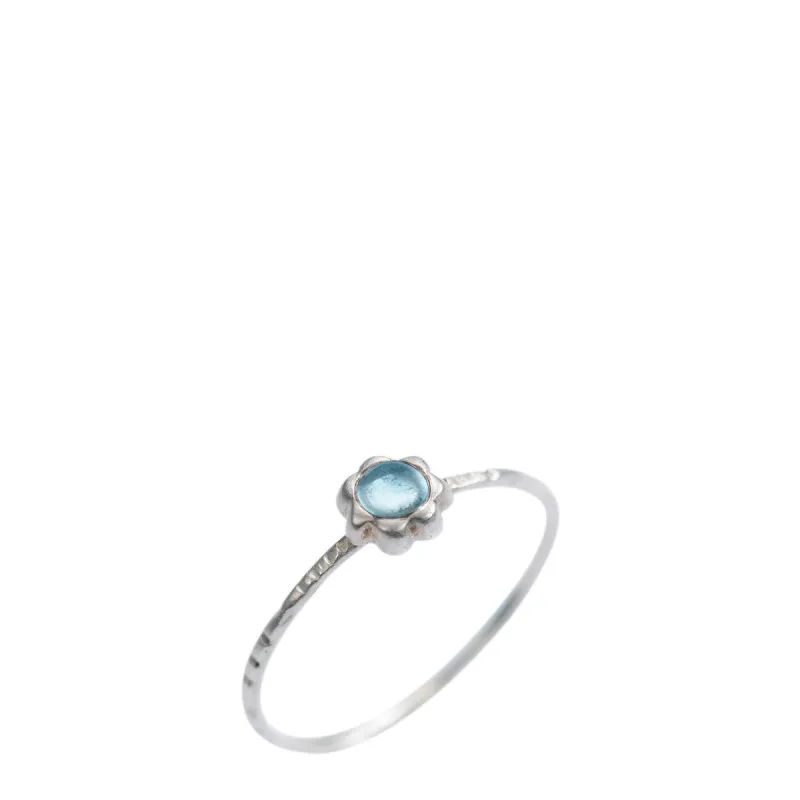 Sterling Silver Star Flower with Blue Topaz Ring sold by Me & Ro