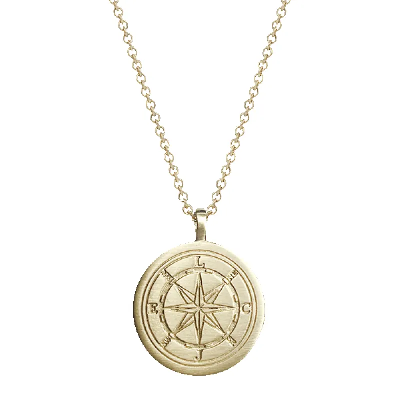 10K Gold Compass Pendant sold by Me & Ro