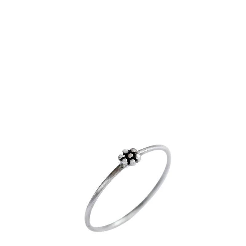 Sterling Silver Tiny Flower Ring sold by Me & Ro