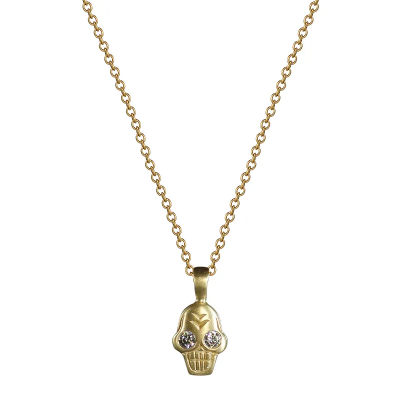 18K Gold Tiny Skull Charm Pendant with Diamonds sold by Me & Ro