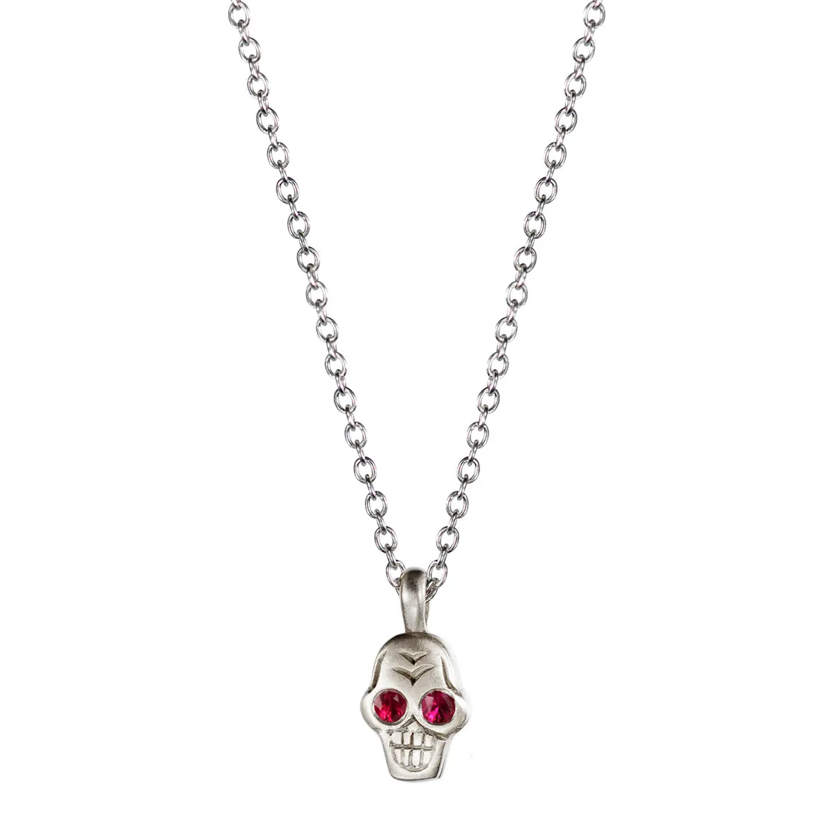 Sterling Silver Tiny Skull Pendant with Ruby Eyes sold by Me & Ro